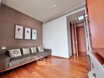 Modern living room with wooden flooring and stylish decor