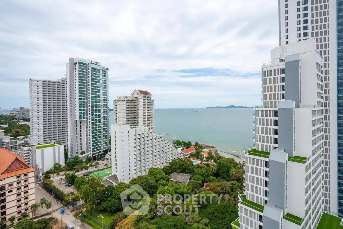 Stunning high-rise ocean view from modern apartment balcony