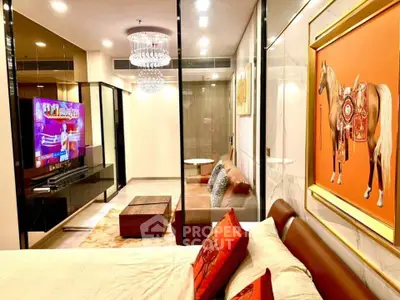 Luxurious living room with modern decor and elegant lighting in a stylish apartment.