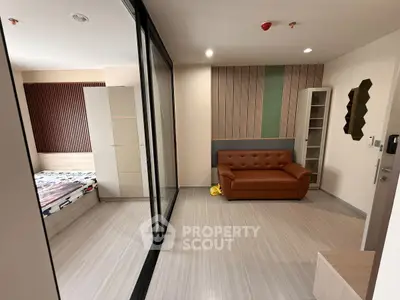 Modern apartment interior with stylish living room and cozy bedroom