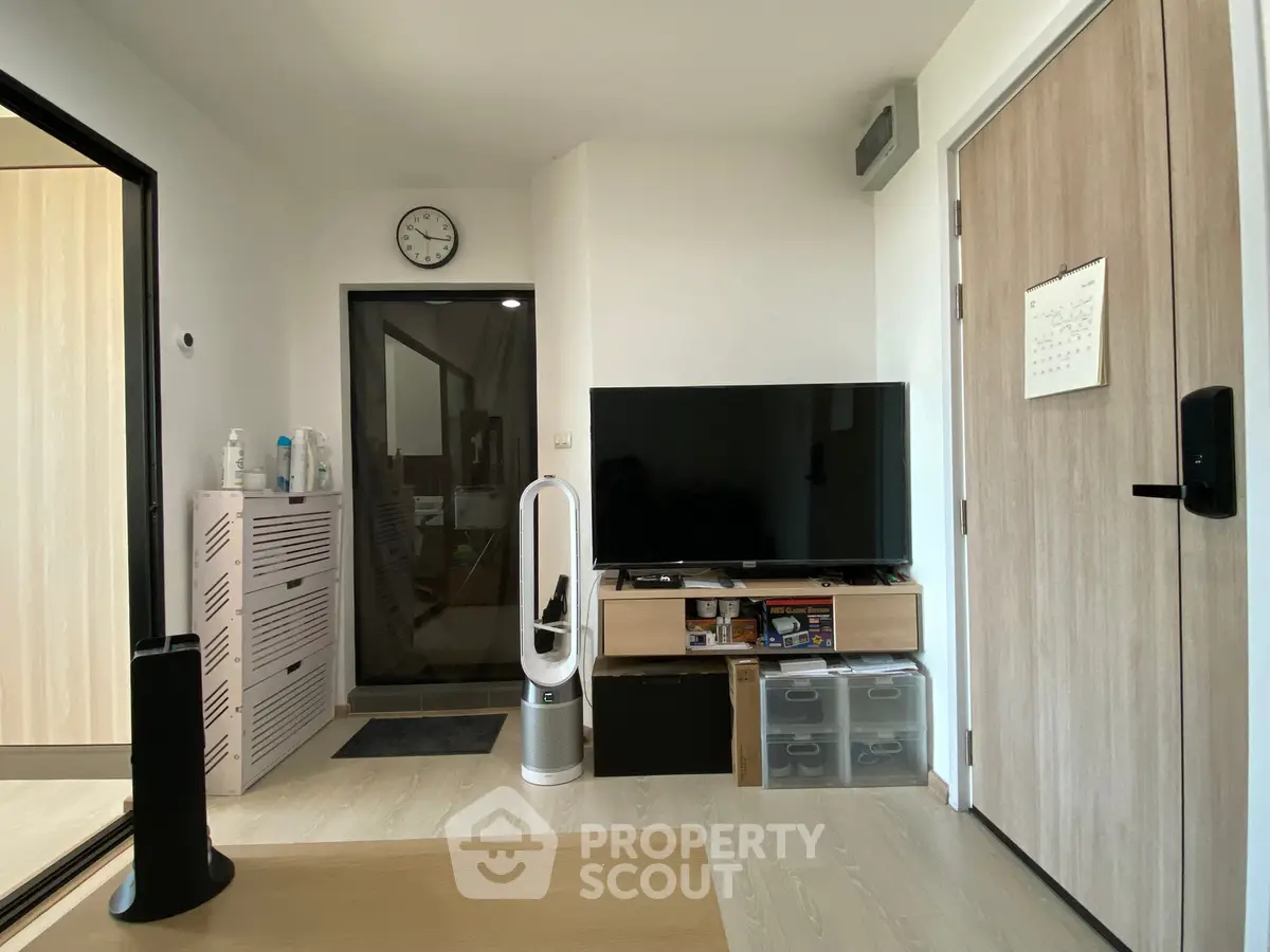Modern living room with sleek TV setup and stylish storage solutions