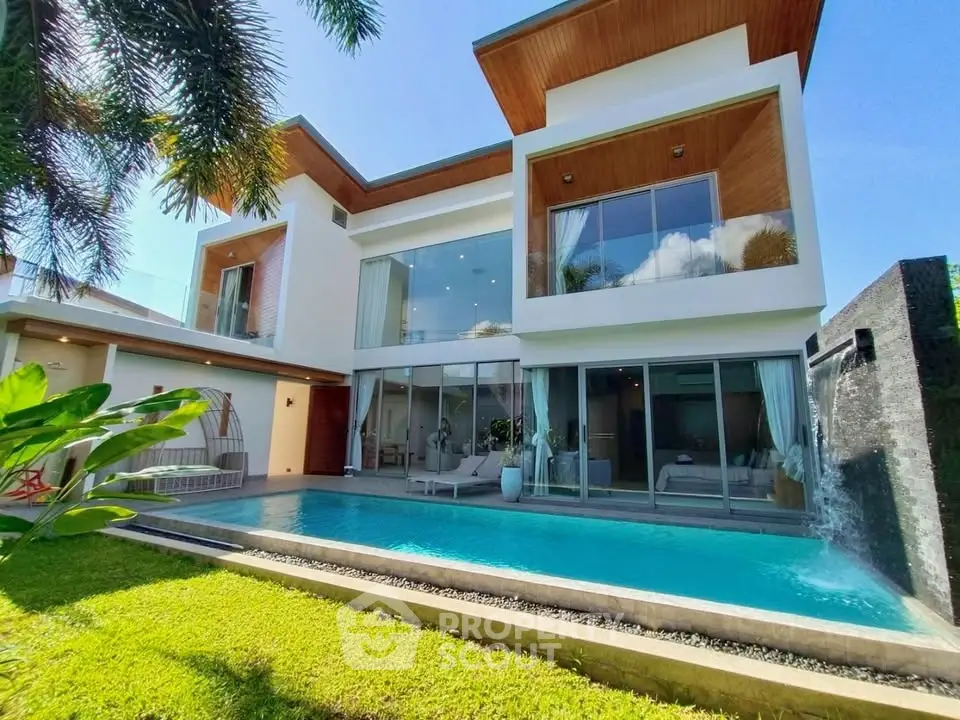Luxurious modern villa with private pool and lush garden, perfect for serene living and entertaining.
