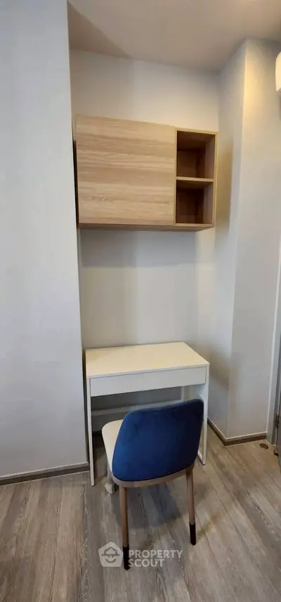 Modern study nook with sleek desk and chair, perfect for productivity.