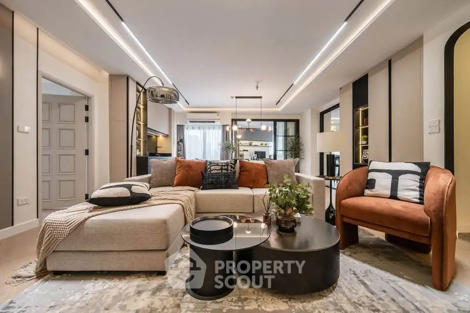 Luxurious modern living room with stylish furniture and elegant decor, perfect for sophisticated urban living.