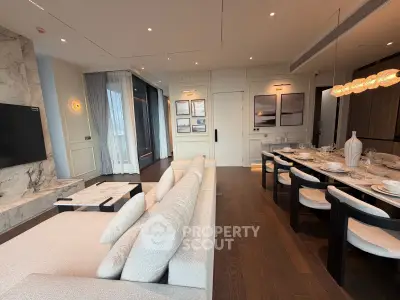 Luxurious modern living room with elegant dining area and stylish decor