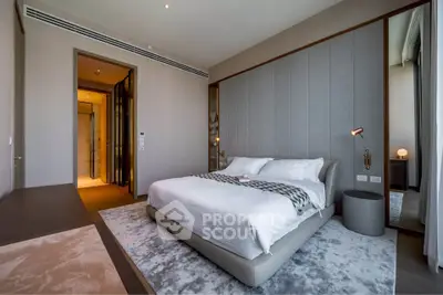 Luxurious modern bedroom with elegant decor and plush bedding