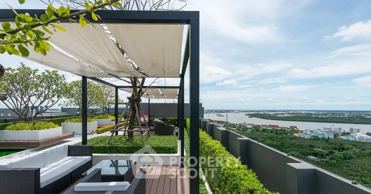 Luxurious rooftop terrace with stunning river view and modern seating area.