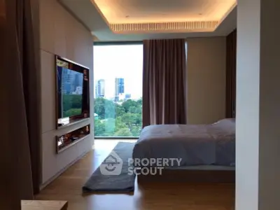 Luxurious bedroom with stunning city view and modern decor