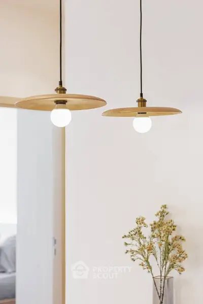 Modern interior with stylish pendant lights and elegant decor.