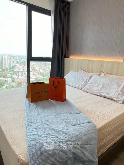 Luxurious bedroom with stunning city view and elegant decor