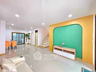 Spacious modern living room with vibrant decor and open layout