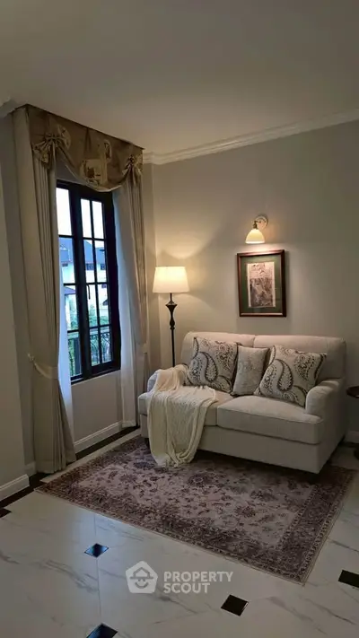 Elegant living room with cozy sofa and stylish decor