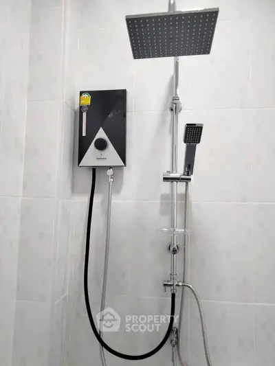 Modern bathroom shower with sleek design and advanced water heater system.