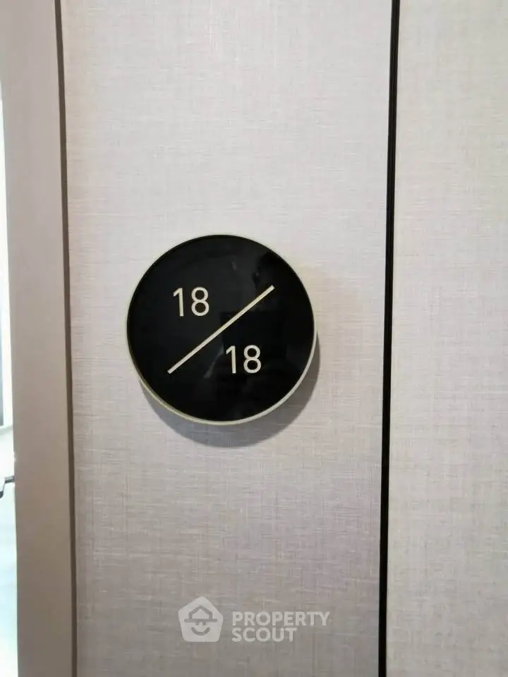 Modern apartment floor number sign with sleek design