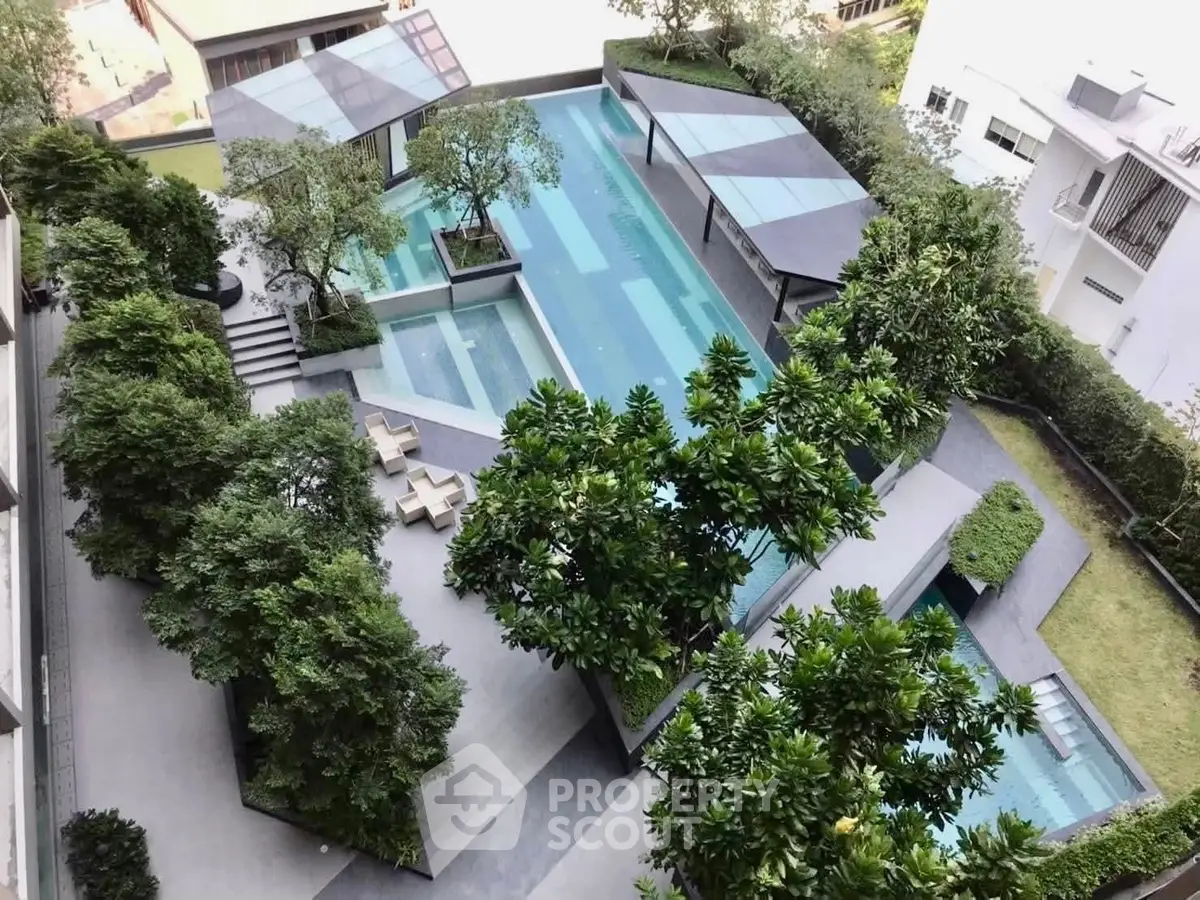 Luxurious rooftop pool with lush greenery and modern design in urban setting