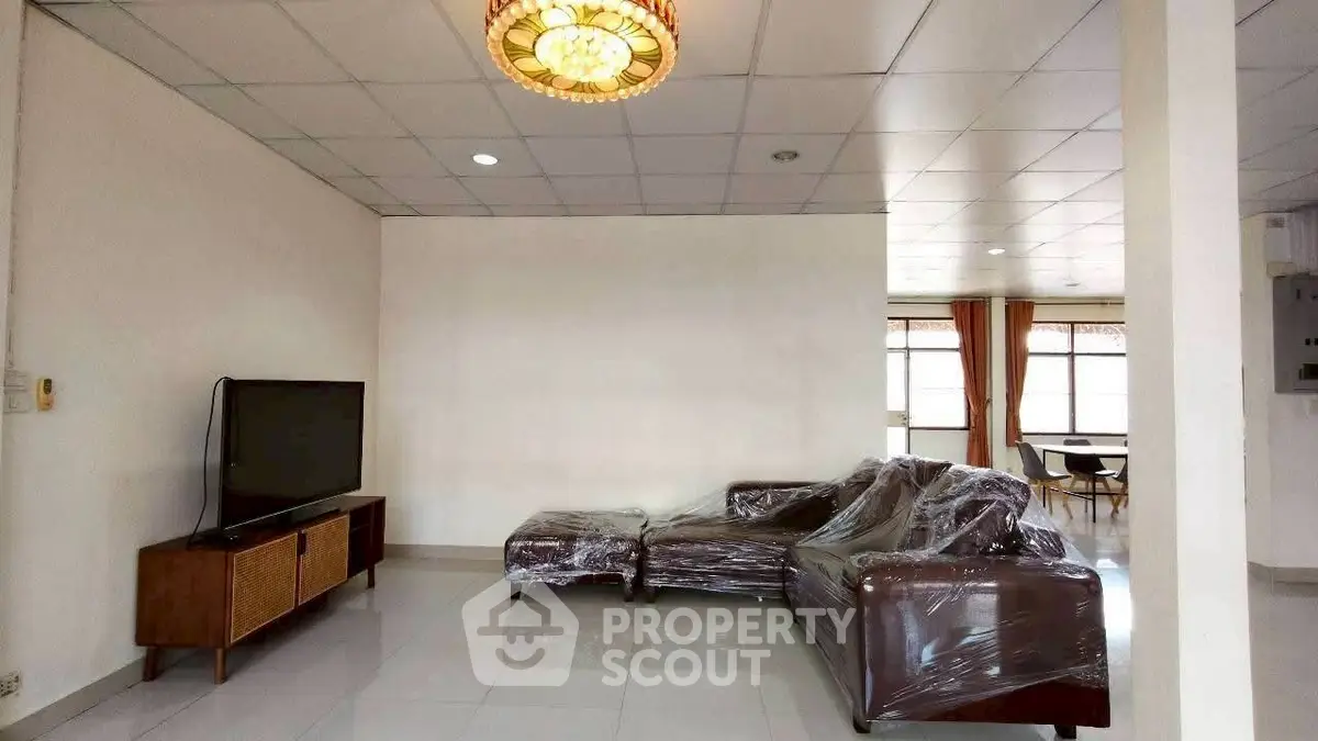 Spacious living room with modern furniture and natural light