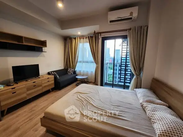 Modern bedroom with balcony view in urban apartment