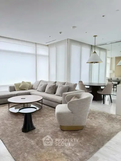 Luxurious modern living room with elegant furniture and natural light