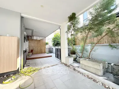 Spacious modern garden patio with elegant design and lush greenery