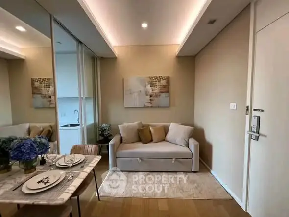 Chic modern living room with cozy sofa and elegant dining setup, perfect for urban living.