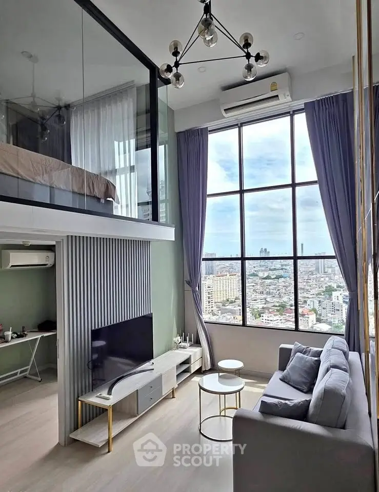 Stunning loft apartment with floor-to-ceiling windows and panoramic city views.