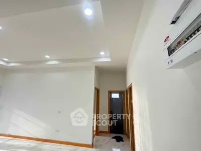 Spacious interior with modern lighting and sleek design, showcasing potential for customization.