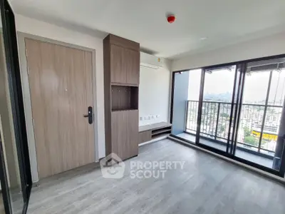 Modern apartment living room with large balcony and city view
