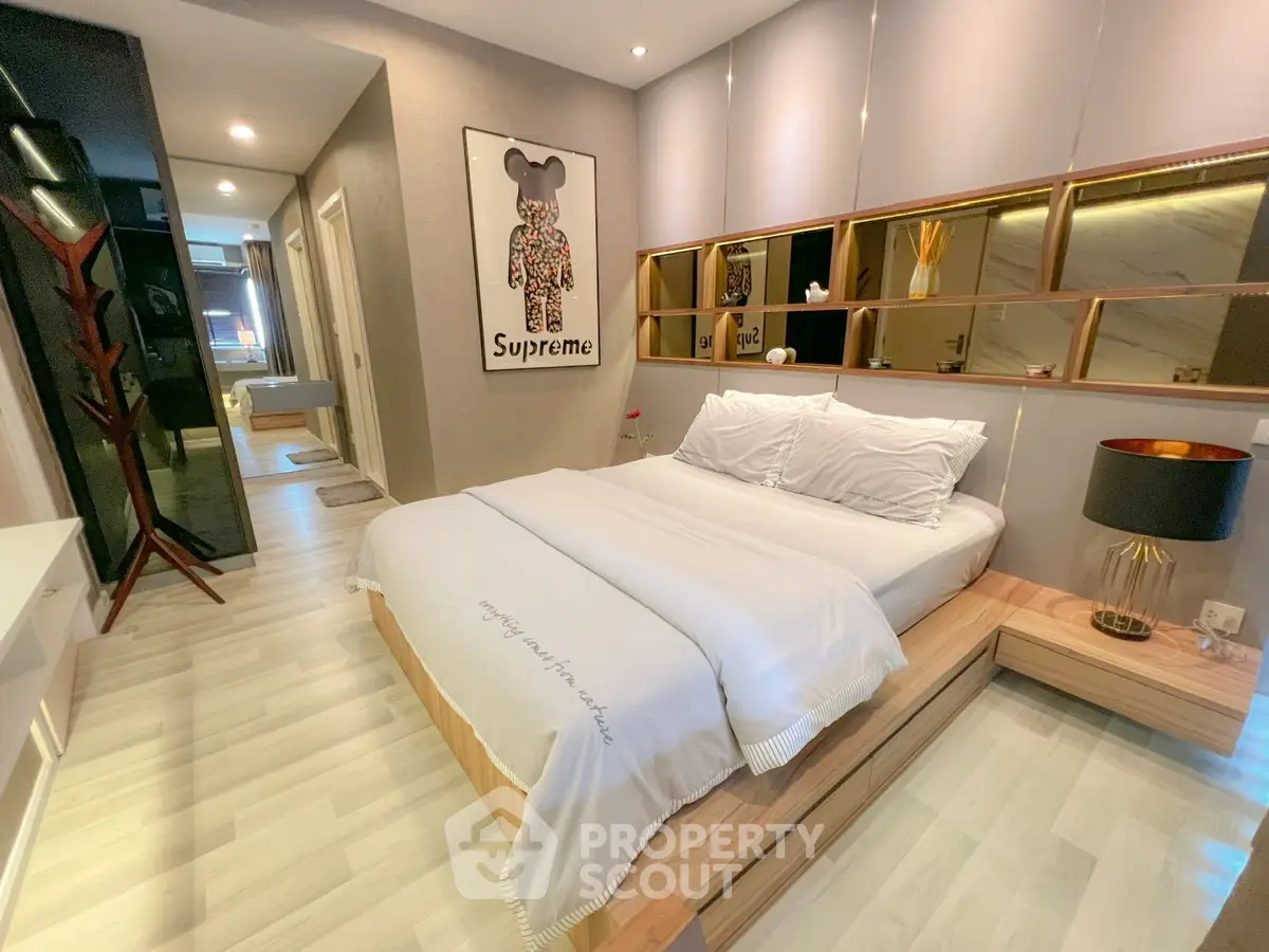 Luxurious modern bedroom with stylish decor and ambient lighting