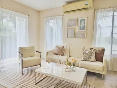 Bright and airy living room with modern decor and large windows