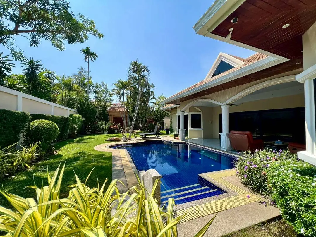 Luxurious villa with private pool and lush garden, perfect for serene living.