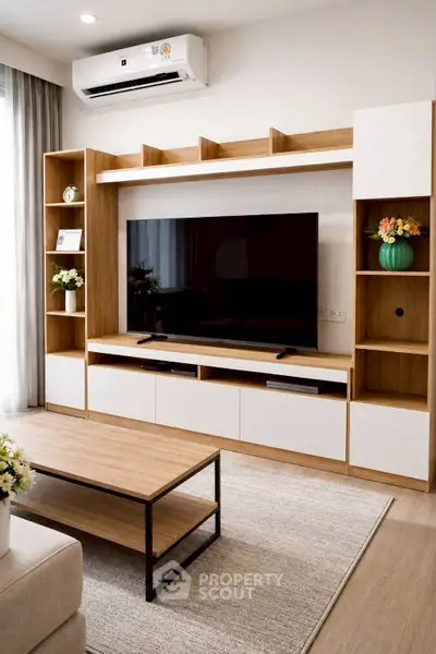 Modern living room with stylish wooden TV unit and cozy decor