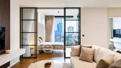 Luxurious modern living room with open view to elegant bedroom and cityscape.