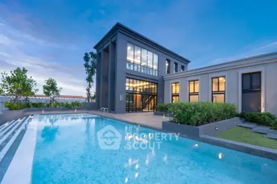 Luxurious modern home with expansive pool and large windows at dusk, showcasing elegant architecture and outdoor living space.