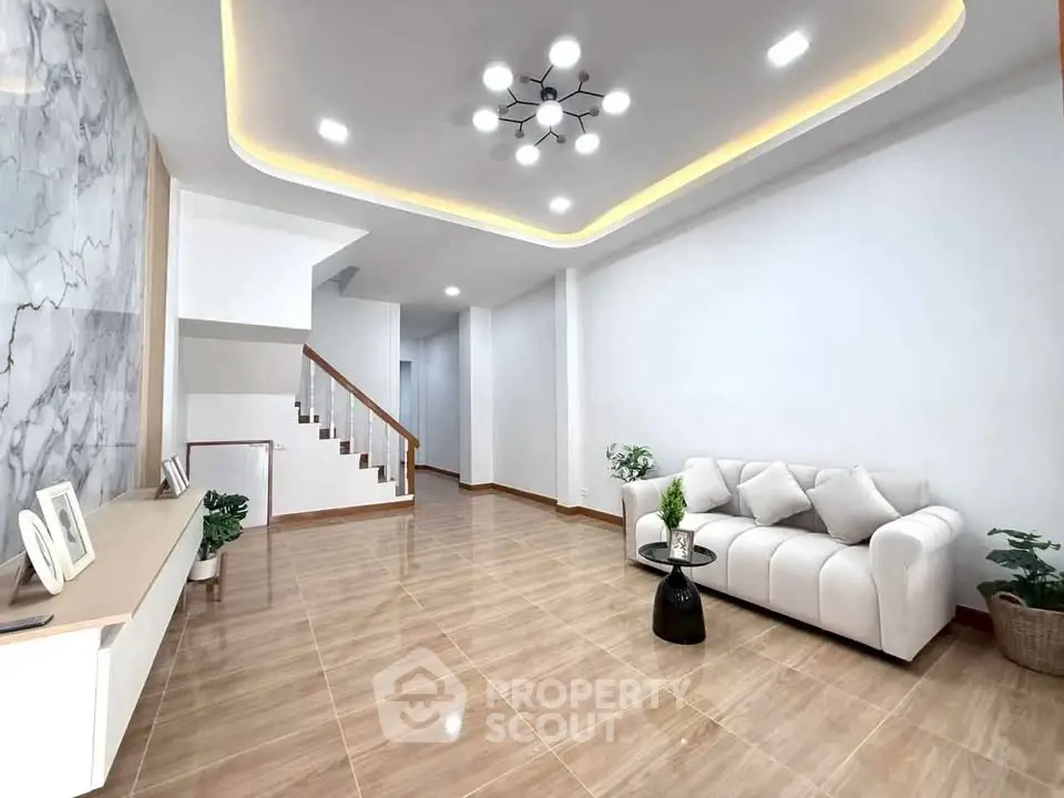 Modern living room with elegant lighting and stylish decor