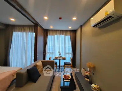 Modern living room with cozy dining area and stylish decor