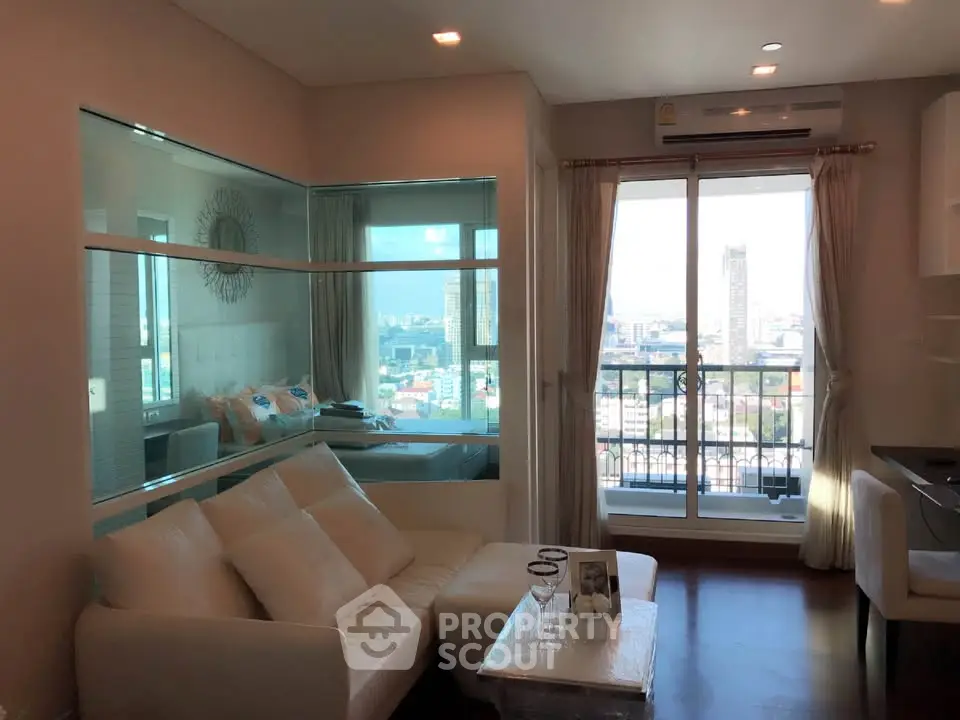 Modern living room with city view and balcony access