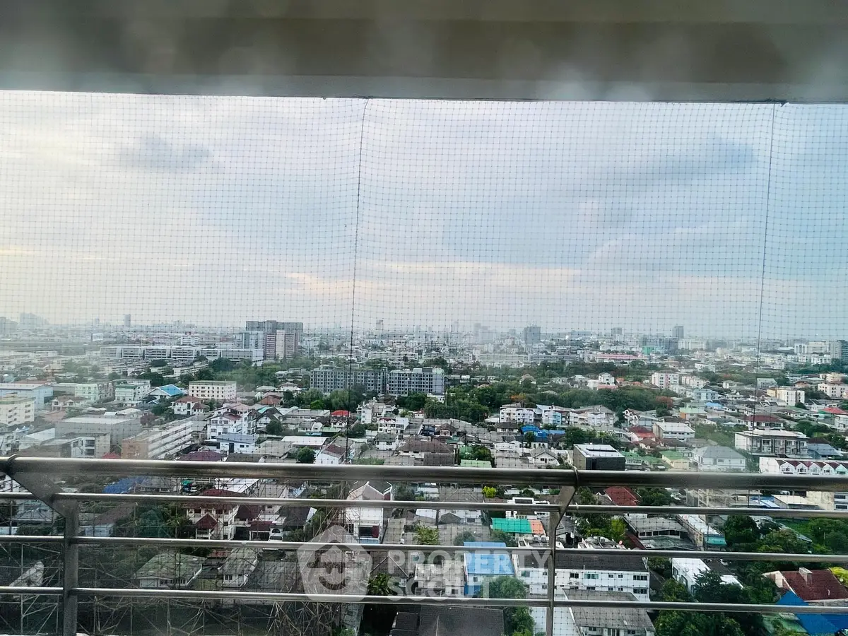 Stunning cityscape view from high-rise balcony with expansive skyline