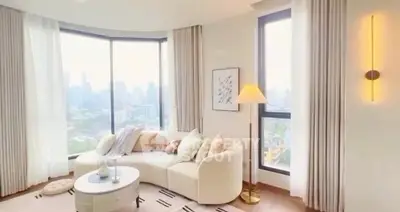 Luxurious living room with panoramic city view and elegant decor