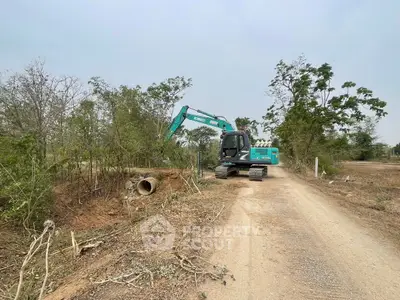 Excavator working on land development for future real estate project