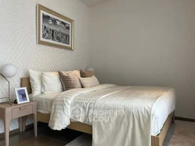 Elegant bedroom with cozy bedding and stylish decor in modern apartment