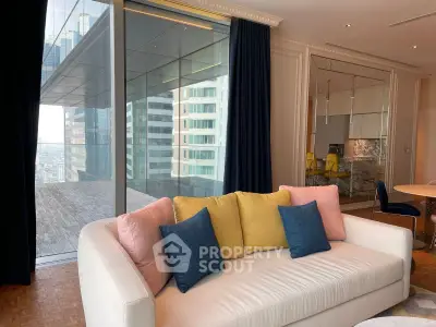 Modern living room with stylish sofa and city view balcony in luxury apartment