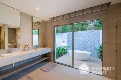 Luxurious bathroom with outdoor bathtub and modern design