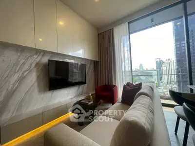 Modern living room with city view, elegant furnishings, and large windows for natural light.