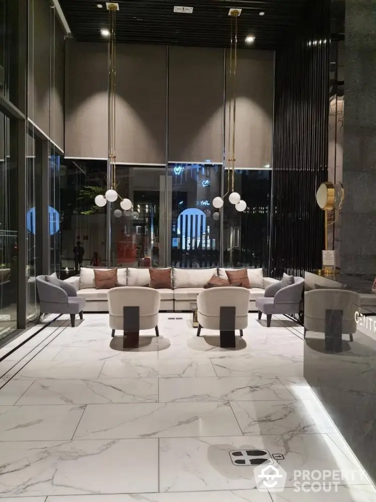 Luxurious modern lobby with elegant seating and marble flooring