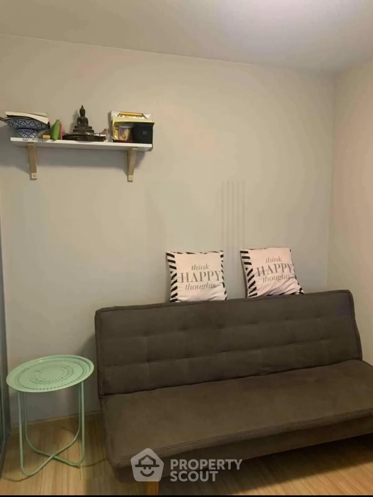 Cozy living room with modern sofa and decorative shelf