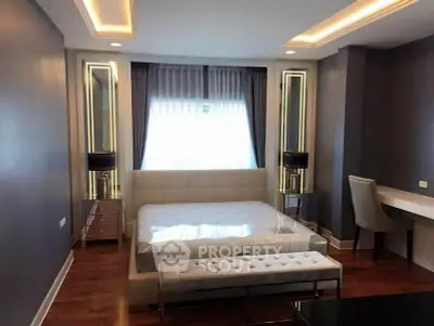 Luxurious modern bedroom with elegant lighting and stylish furniture