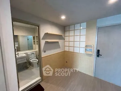 Modern bathroom with sleek design and ample storage space