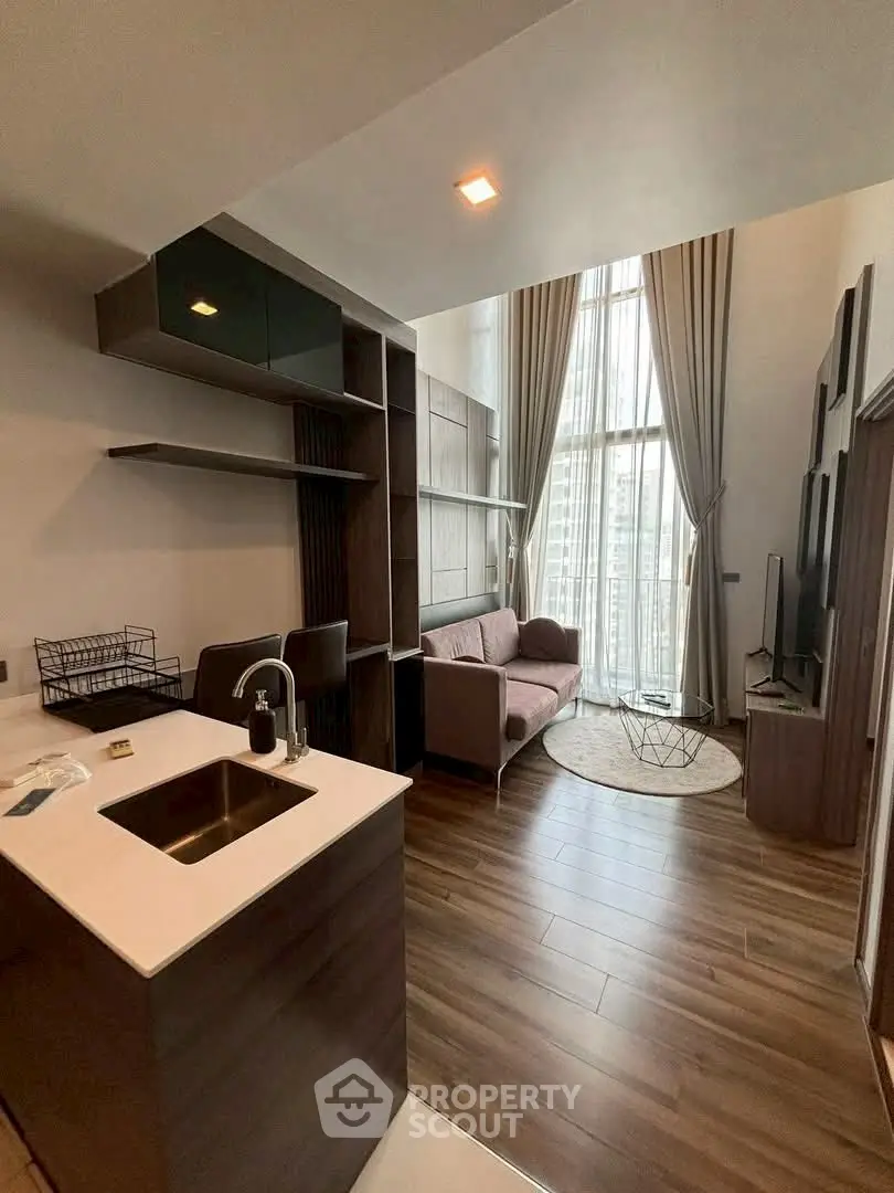 Modern loft apartment with high ceilings and elegant interior design