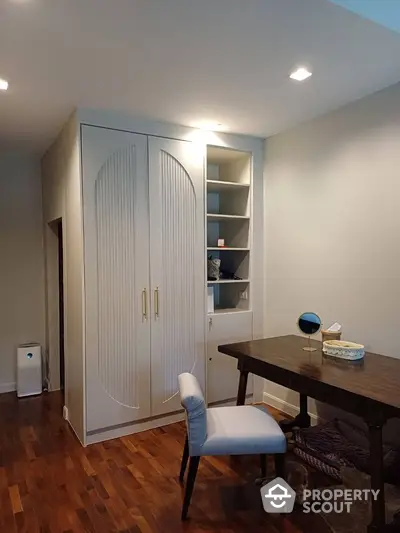 Modern study room with elegant wooden desk and stylish storage solutions