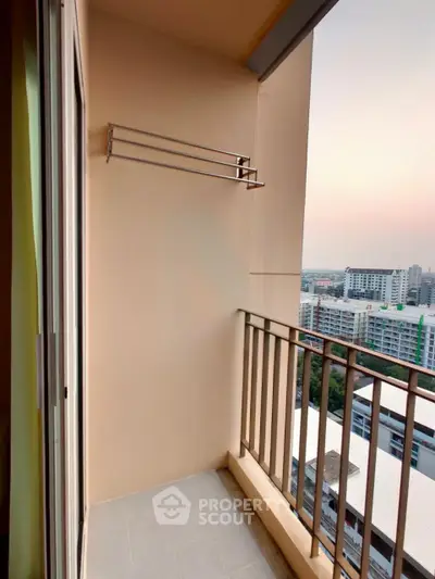 Charming balcony with city view, perfect for relaxation and enjoying sunsets.